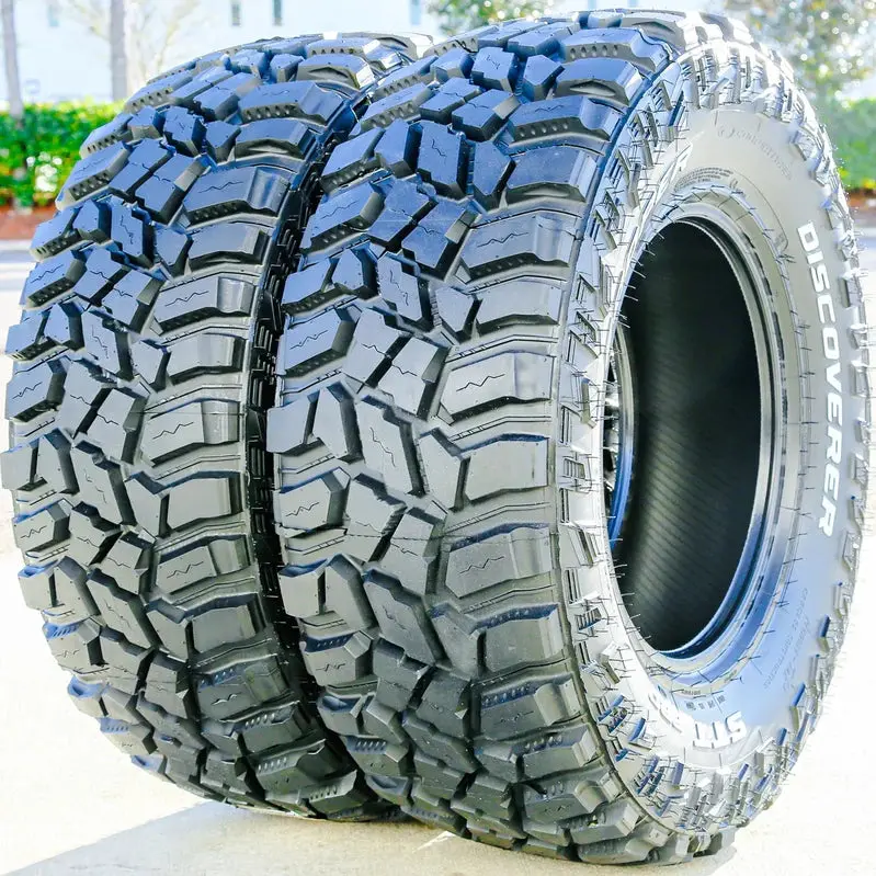 Four Cooper STT Pro LT 275/70R18 E-Rated Off-Road Mud-Terrain Tires with Bold Tread Pattern